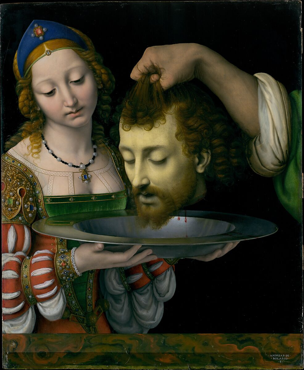 solario c. 1507, salome receiving the head of john the baptist. a young woman holds out a silver platter into which the blood drains from a detatched head, held by the roots of its hair by an unseen person.